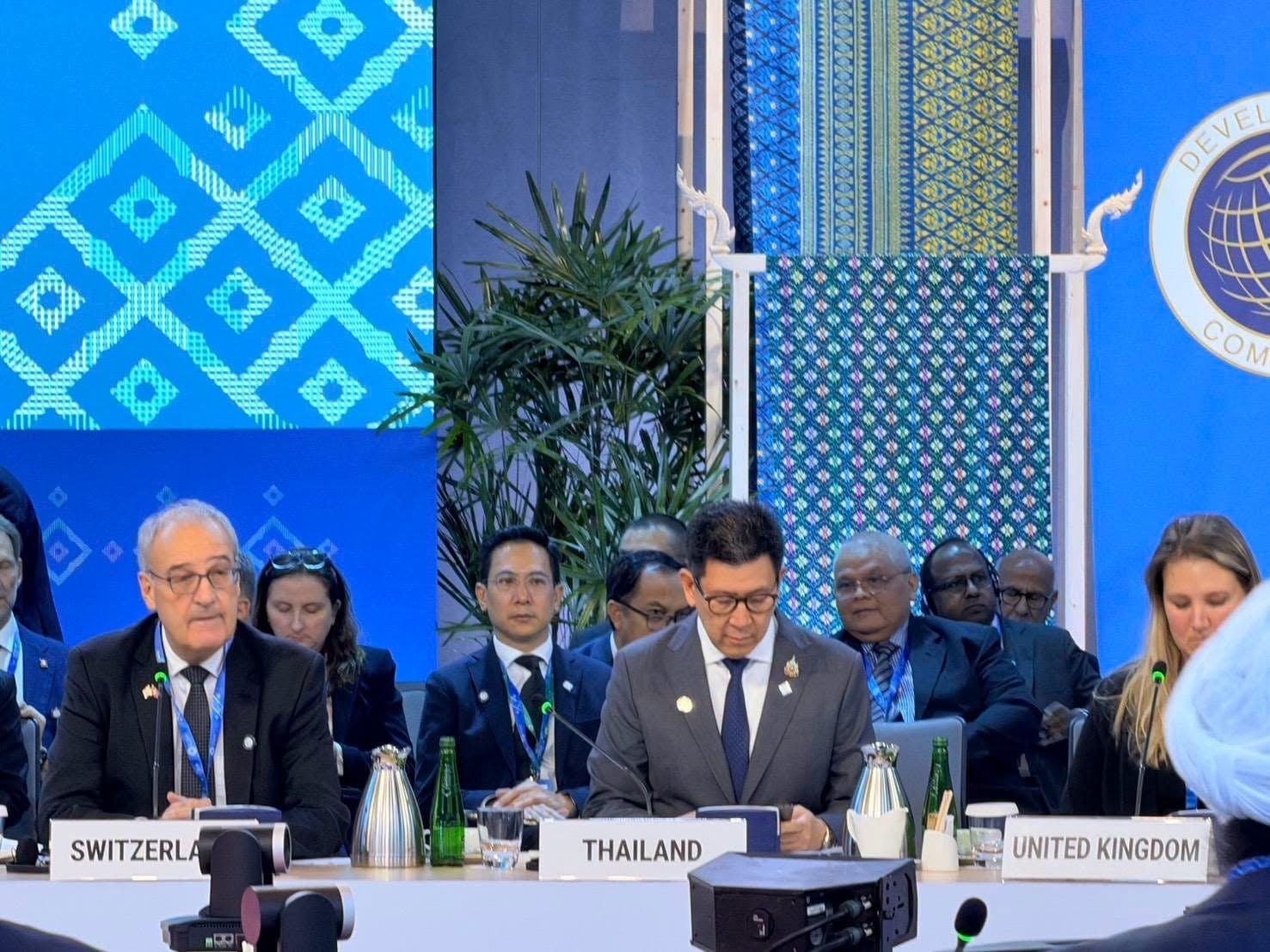 The 114th Development Committee meeting: Ekniti Nitithanprapas at the THAILAND placard.