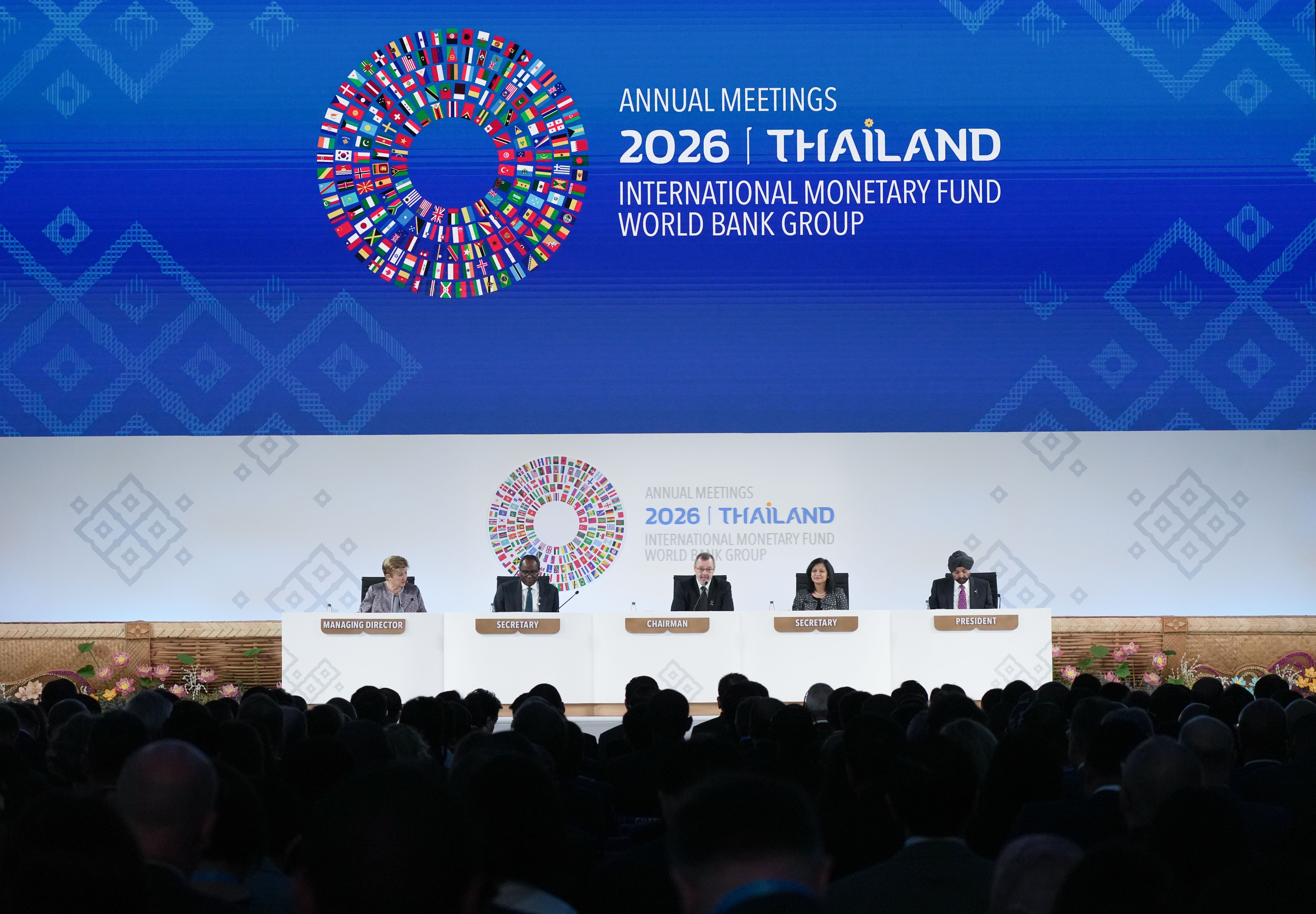 The Annual Meetings Plenary dais at the Queen Sirikit National Convention Center: IMF Managing Director Kristalina Georgieva, Annual Meetings Chairman Carlos Carvallo Spalding, and World Bank President Ajay Banga.