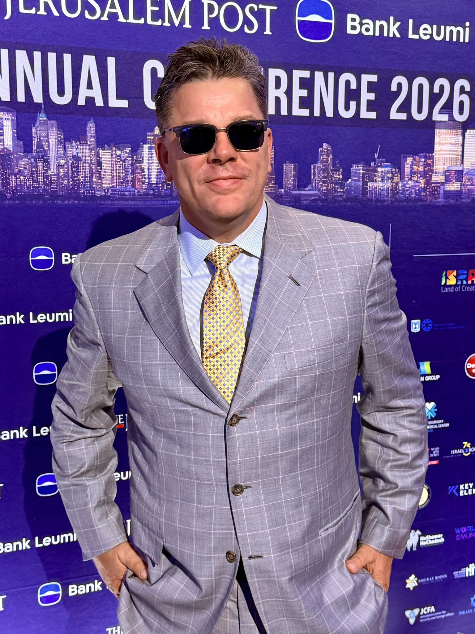 LIKE Magazine publisher Michael de la Force poses on the red carpet at the Jerusalem Post Annual Conference 2026.