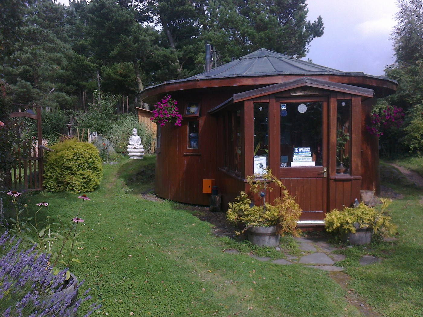 Round house built from an old whisky barrel in the Findhorn Ecovillage