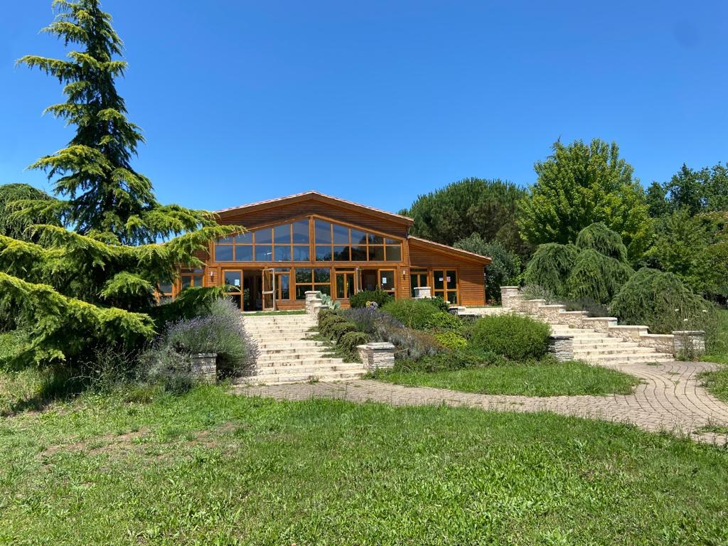 Still Water Meditation Hall at the Upper Hamlet across its lawn