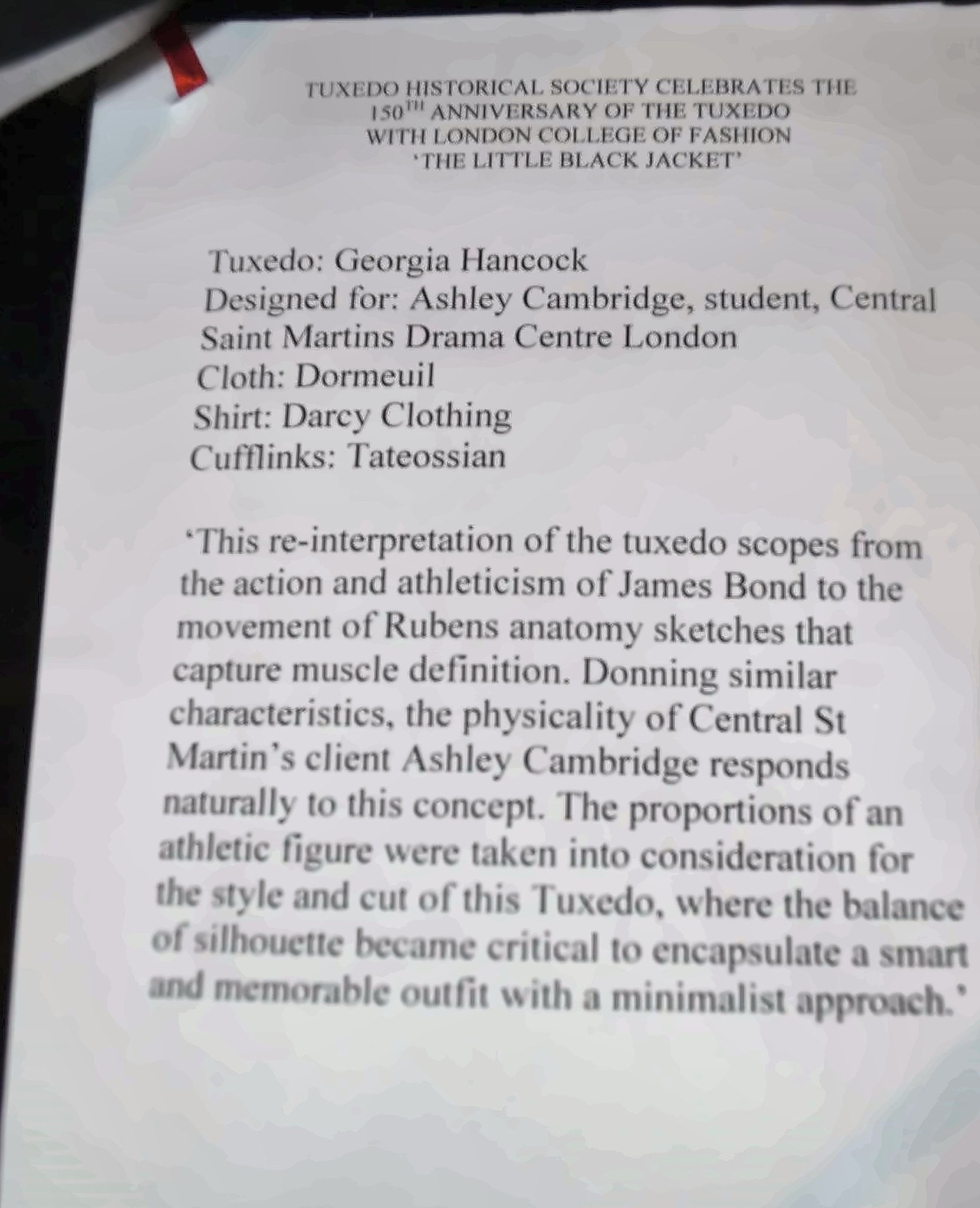 Exhibit card. Tuxedo: Georgia Hancock. Designed for: Ashley Cambridge, student, Central Saint Martins Drama Centre London. Cloth: Dormeuil. Shirt: Darcy Clothing. Cufflinks: Tateossian.