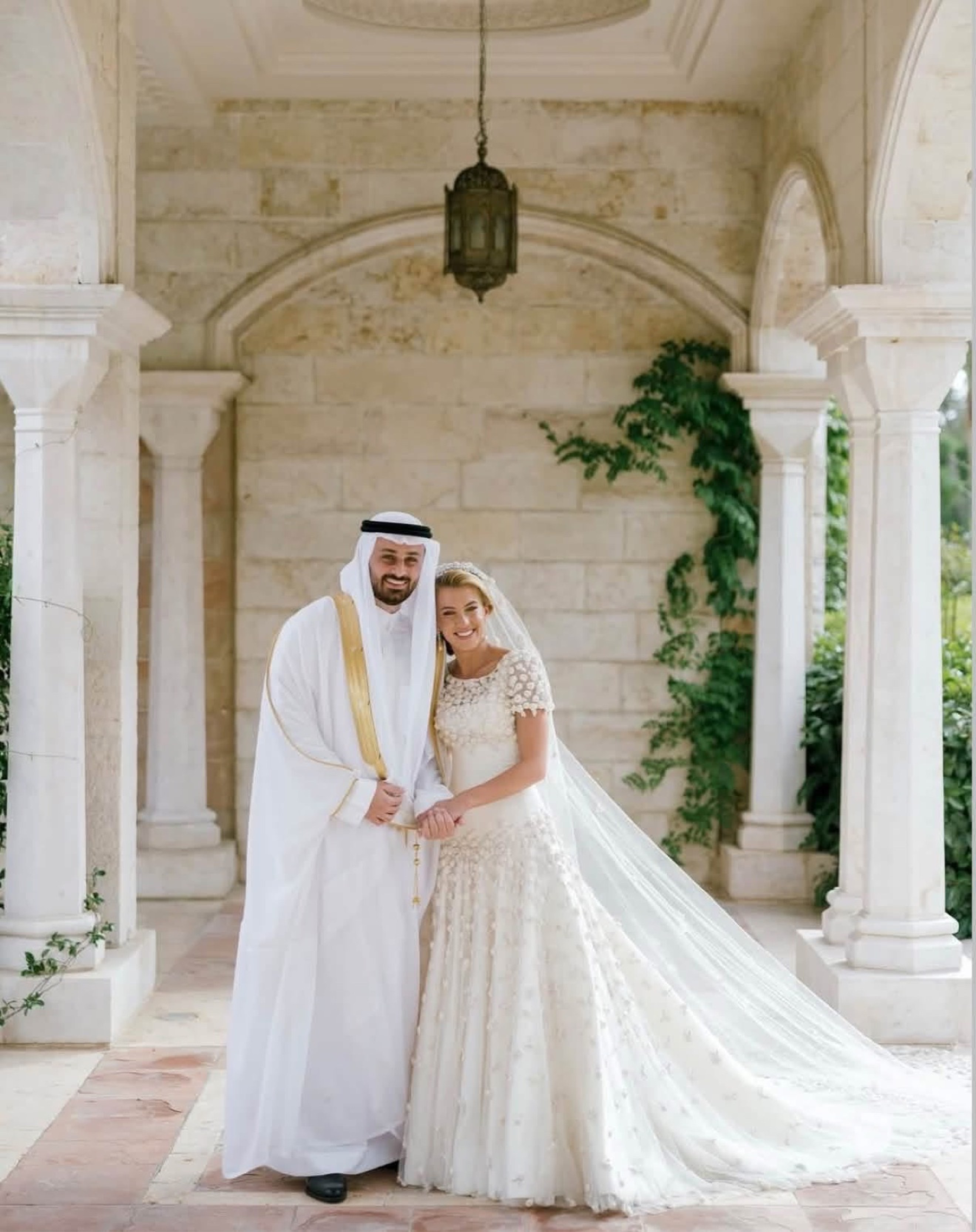 Princess Sara bint Faisal and Ali Murabet Al Sawaf in the colonnade of Zahran Palace, Amman