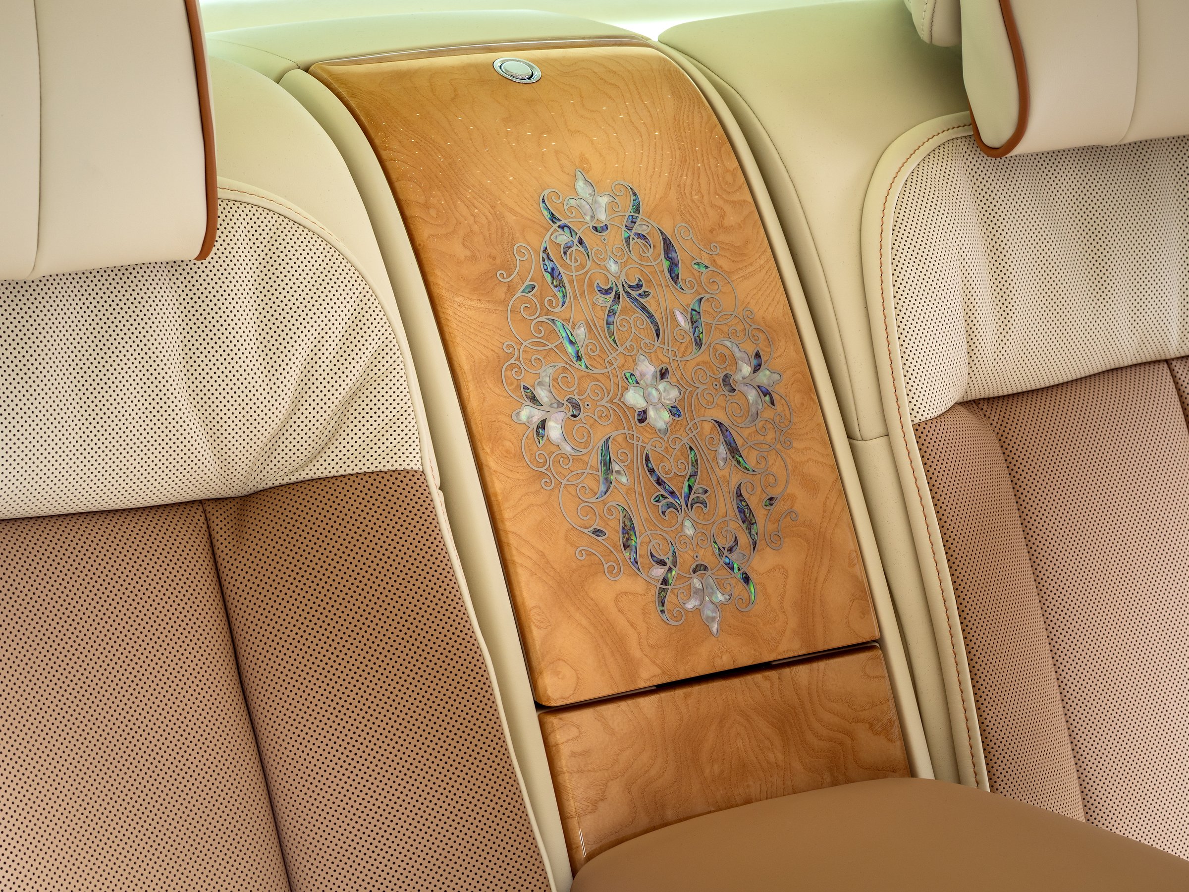 Botanical marquetry motif on the Rear Waterfall panel between the rear seats of Phantom Hummingbird