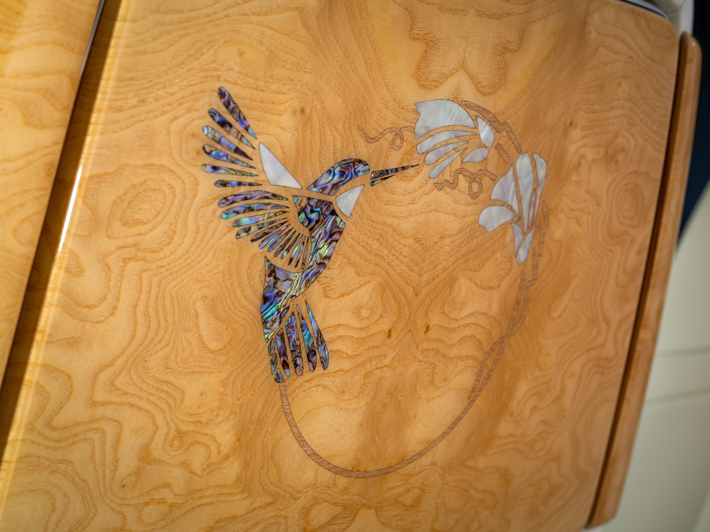 Hummingbird marquetry in abalone shell and mother-of-pearl on a Phantom Hummingbird Picnic Table. Courtesy Rolls-Royce Motor Cars